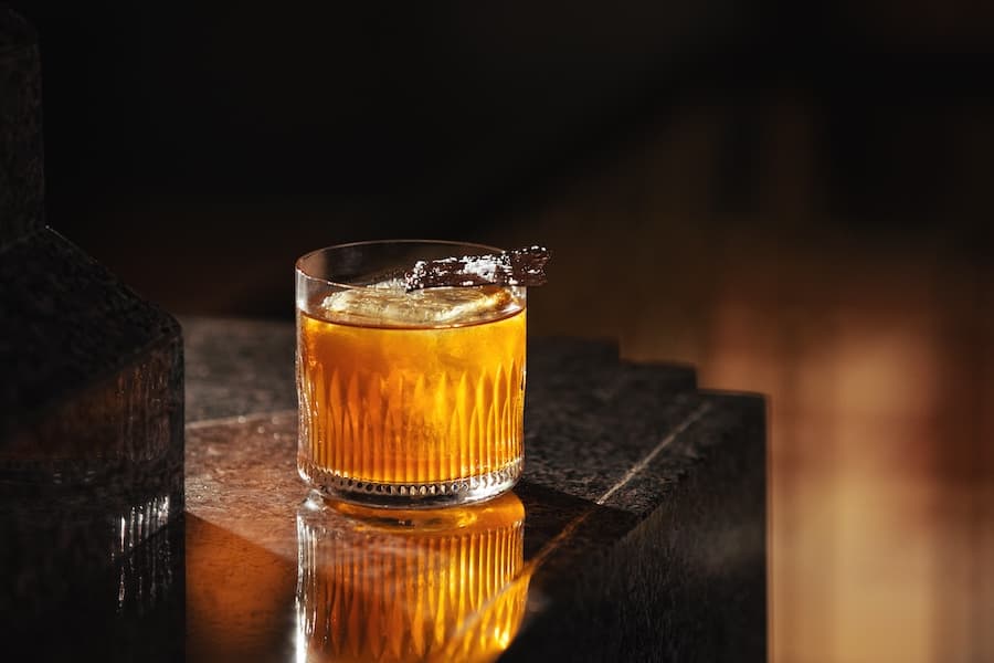 Simple Pleasures: Old Fashioned, single rock, neat garnish.