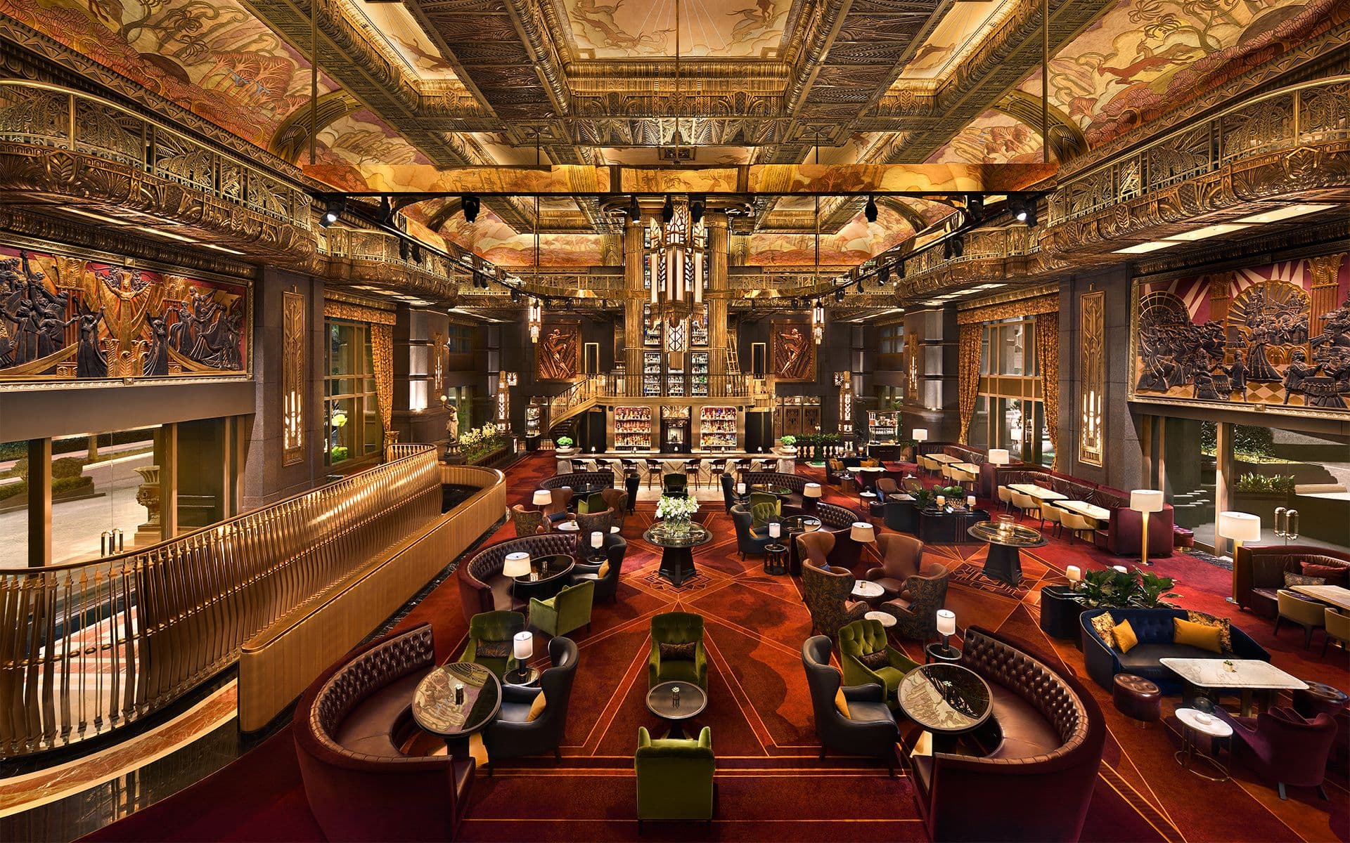 Inside ATLAS Singapore: the floor-to-ceiling gin tower behind the main bar.